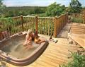 Make the most of the hot tub at Ashby Woulds Lodges, Derbyshire