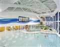 Enjoy a dip in the pool at Chalet Six VIP Platinum; Newton Abbot