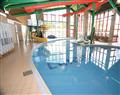 Relax in the swimming pool at Oak; Shanklin