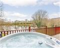 The family will have a great time at Signature Lakeside Lodge with Hot Tub; Honiton