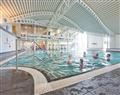 Relax in the swimming pool at Silver 3 Country Home; Carnforth