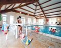 Relax in the swimming pool at WB 2 Bed Bronze Caravan; Bude