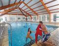 Relax in the swimming pool at Widemouth Poppy Silver; Bude